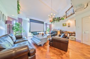 Lounge with projector screen down- click for photo gallery